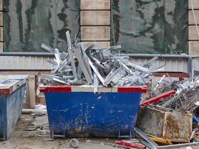Removal of debris. Construction waste. Building demolition. Devastation background