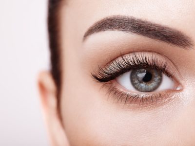 Female eye with long false eyelashes