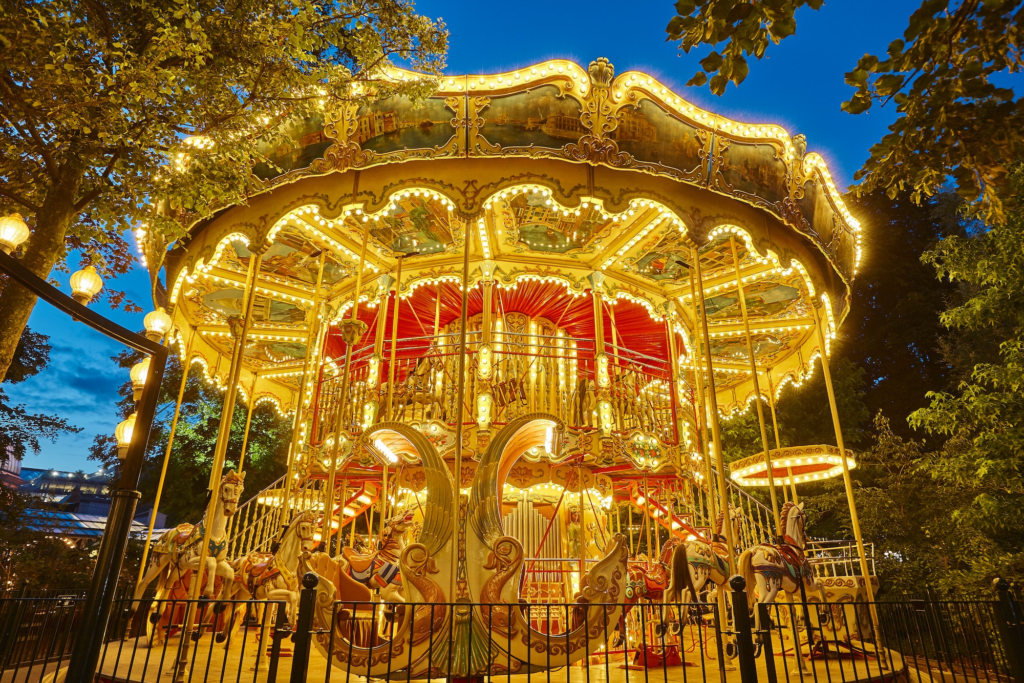 Merry go round carousel childhood entertainment. Vintage playground attraction. Adorable