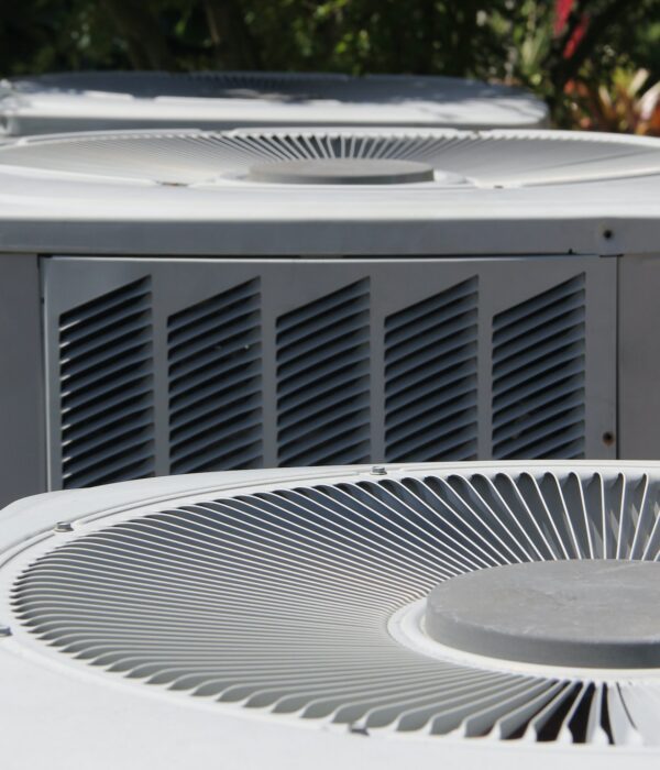 Couple of Home Central Heating Ventilation and Air Conditioner Outdoor Units.